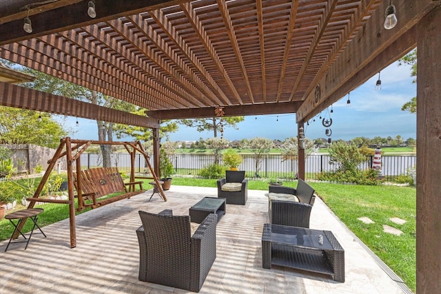 view of patio featuring a water view and a pergola