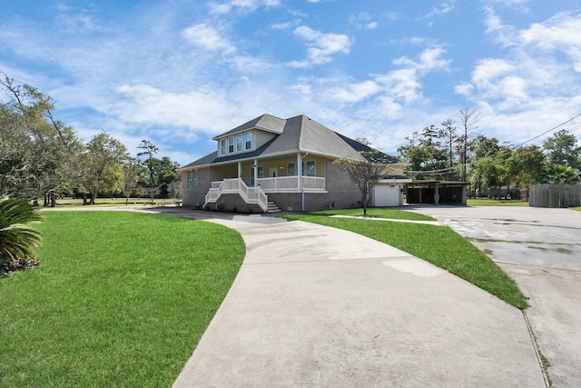 view of front of home featuring a front lawn and covered porch