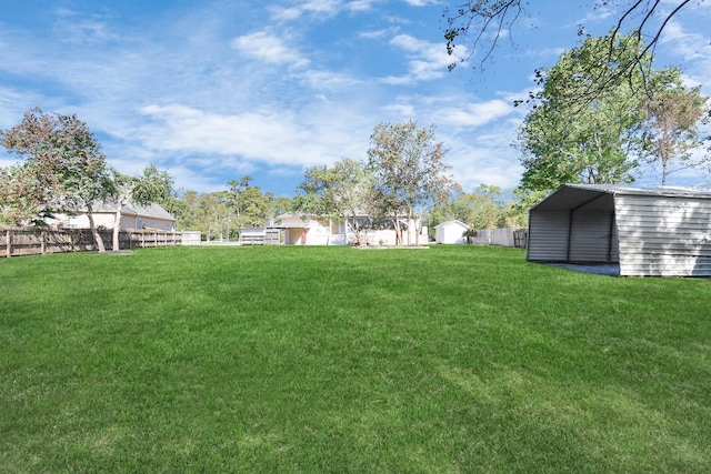 view of yard featuring a carport