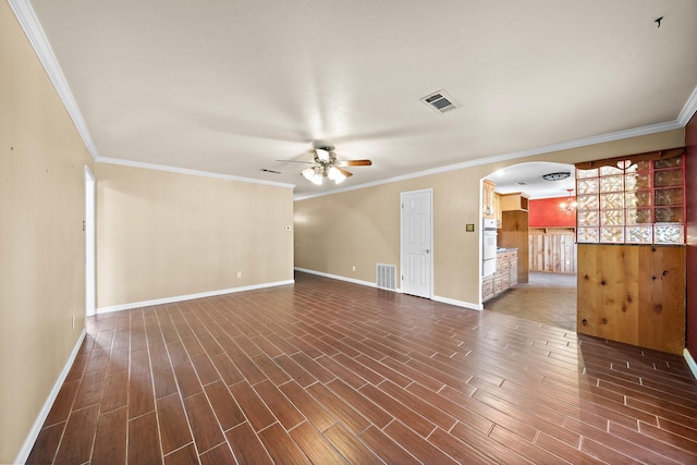 unfurnished living room featuring dark hardwood / wood-style floors, ceiling fan, and ornamental molding