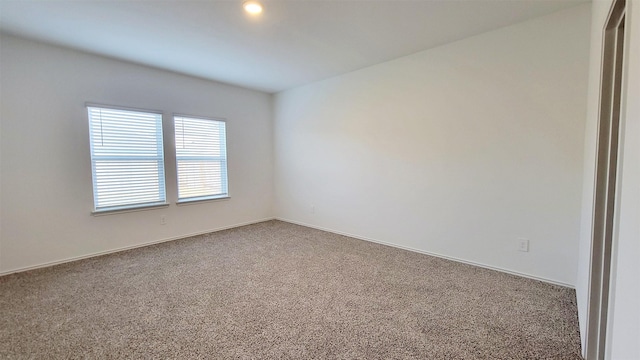 unfurnished room featuring carpet floors