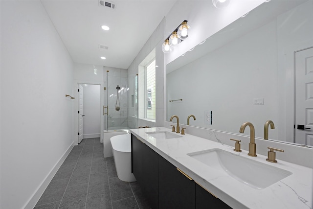 bathroom with separate shower and tub, tile patterned floors, and vanity