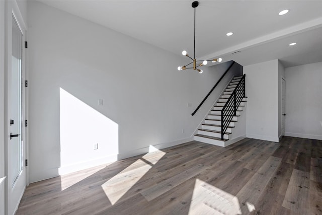 interior space featuring a chandelier and hardwood / wood-style flooring