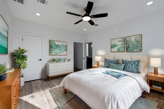 bedroom featuring light wood-type flooring and ceiling fan