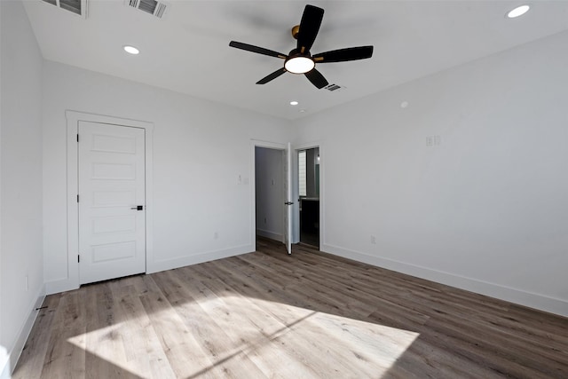 unfurnished bedroom featuring ceiling fan and wood-type flooring