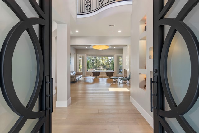 entrance foyer featuring light hardwood / wood-style flooring