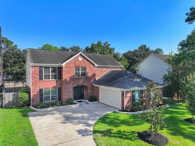 view of front of home with a front lawn and a garage