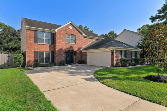 view of front of home featuring a garage and a front lawn