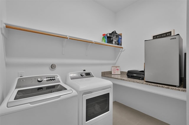 laundry area featuring washer and clothes dryer