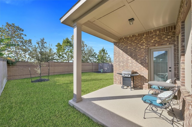 view of patio with a grill