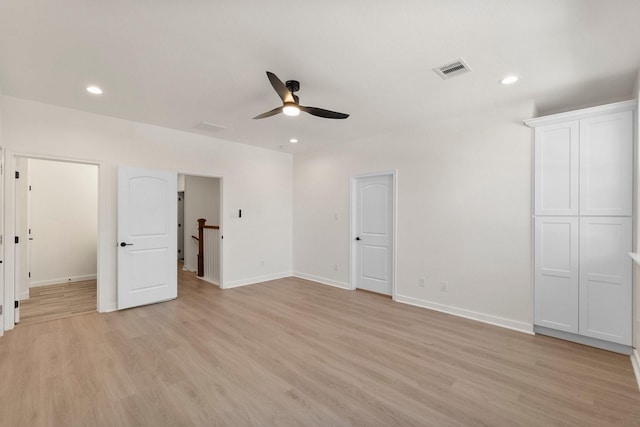 unfurnished bedroom featuring light hardwood / wood-style flooring and ceiling fan