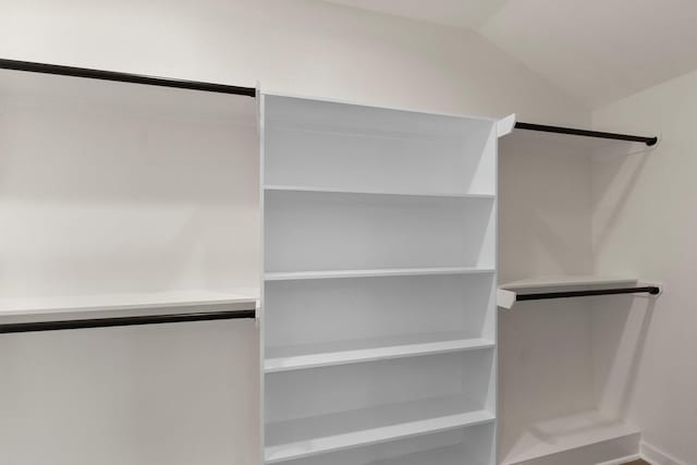 spacious closet featuring vaulted ceiling