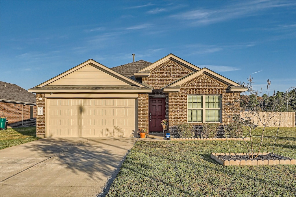 ranch-style house with a front lawn and a garage