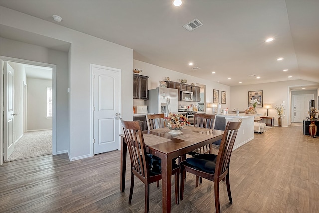 dining room featuring light hardwood / wood-style flooring