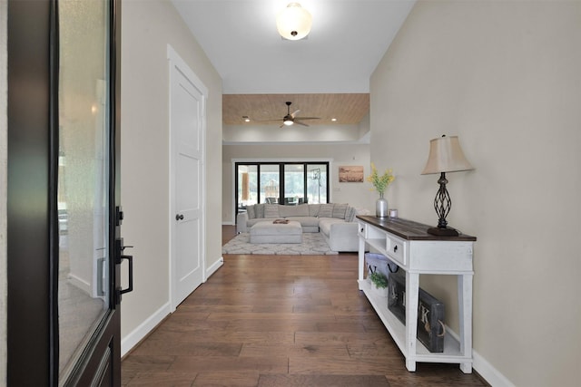 entryway featuring ceiling fan and dark hardwood / wood-style flooring