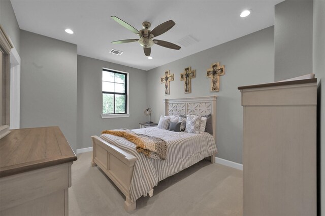 carpeted bedroom with ceiling fan