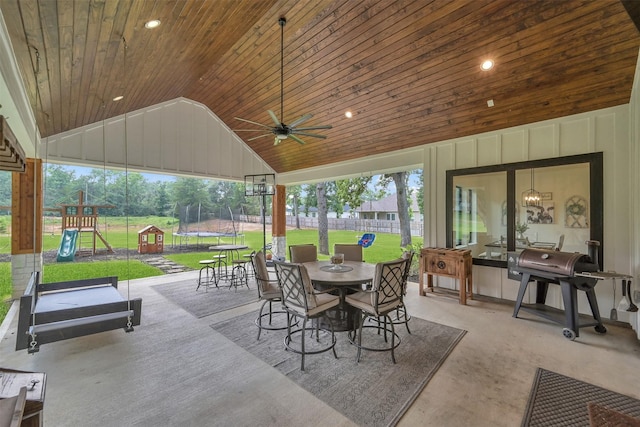 view of patio / terrace featuring a playground, ceiling fan, and a trampoline