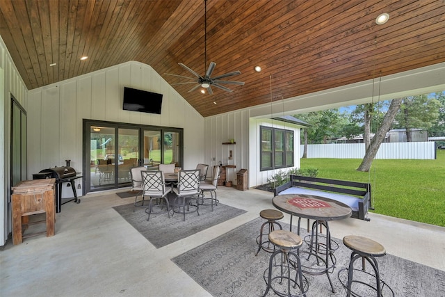 view of patio with ceiling fan and area for grilling