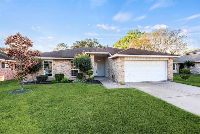 ranch-style house featuring a garage and a front lawn