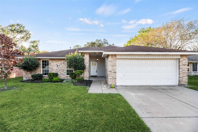 ranch-style house with a garage and a front lawn