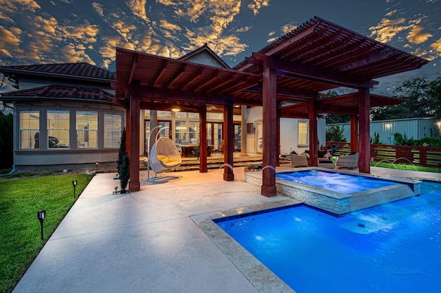 view of swimming pool with an outdoor hangout area, an in ground hot tub, a pergola, and a patio