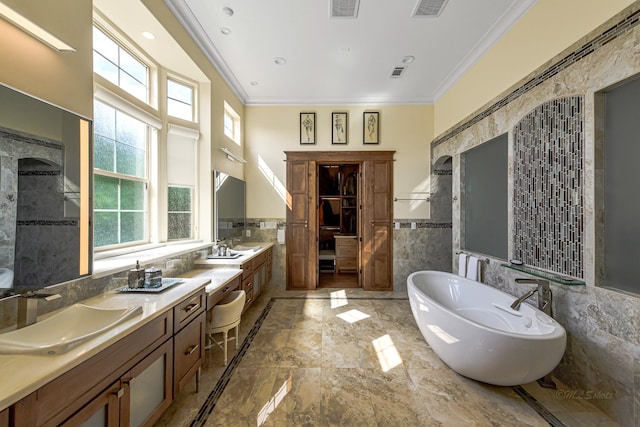 bathroom with a tub to relax in, vanity, tile walls, and ornamental molding