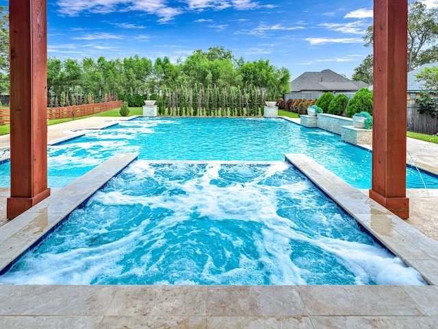 view of pool featuring pool water feature