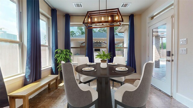 dining room featuring a chandelier