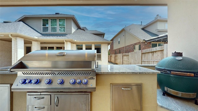 view of patio / terrace with exterior kitchen and grilling area