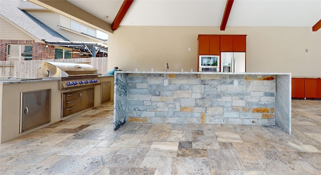 view of patio / terrace with an outdoor kitchen and area for grilling