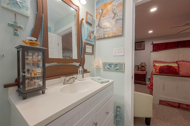 bathroom with vanity and ceiling fan