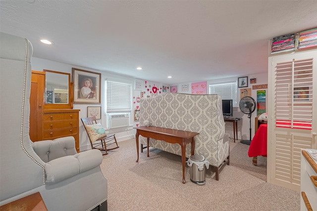 bedroom featuring carpet floors and cooling unit