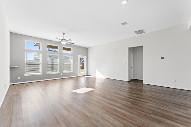 unfurnished room featuring dark hardwood / wood-style floors and ceiling fan