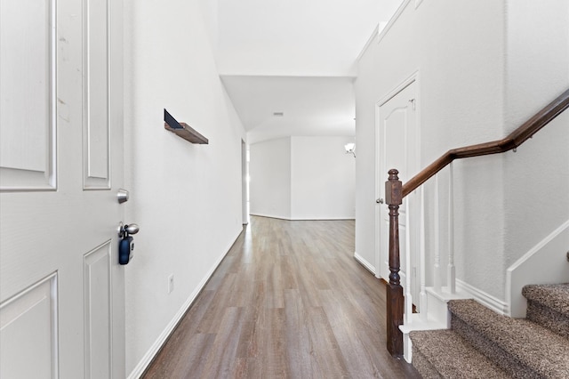 entrance foyer featuring a chandelier and light hardwood / wood-style floors