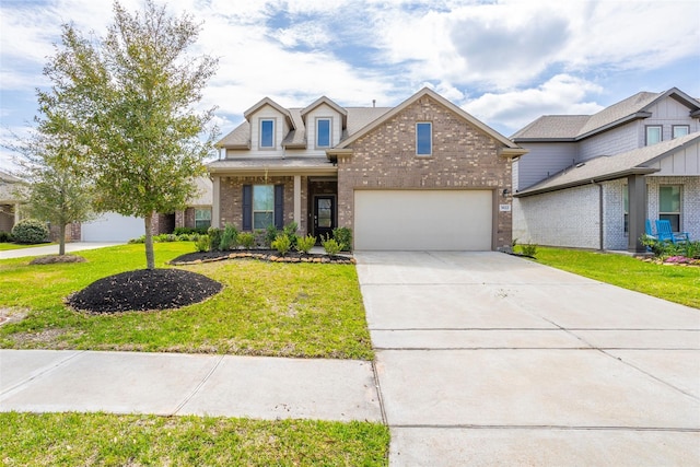 view of front facade with a front yard and a garage