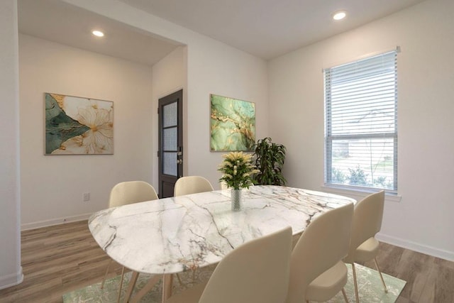 dining room featuring wood-type flooring