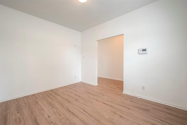 empty room with light wood-type flooring