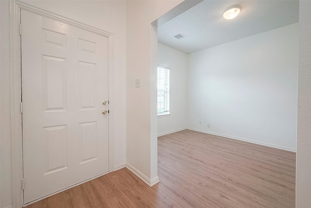 entrance foyer featuring light hardwood / wood-style floors