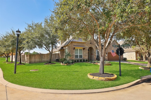 view of front facade with a front yard