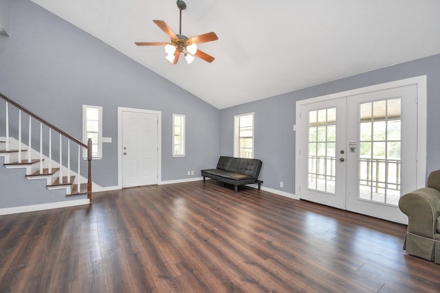 foyer with french doors, dark hardwood / wood-style floors, high vaulted ceiling, and ceiling fan