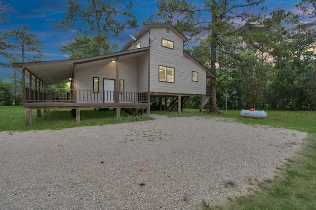 view of front of property with a lawn