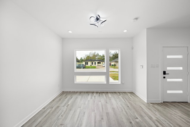 entrance foyer with light hardwood / wood-style floors