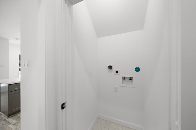 washroom with hookup for an electric dryer and washer hookup