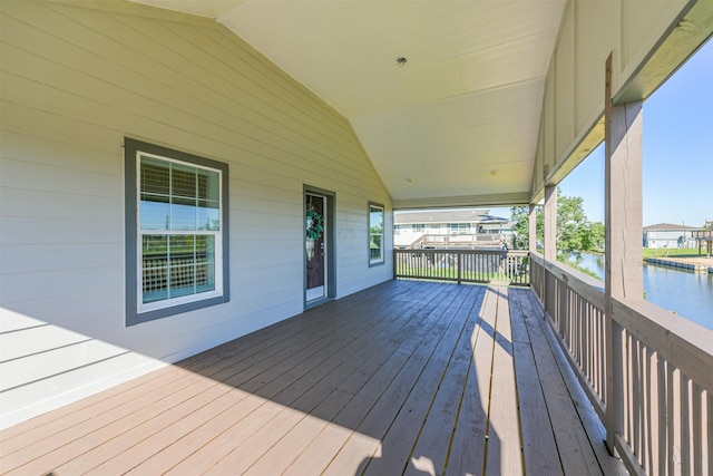 deck featuring a water view