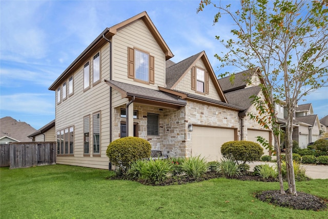 view of front of home featuring a garage and a front yard