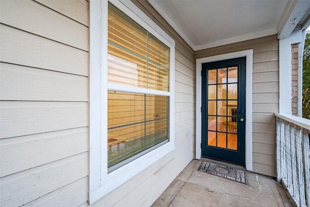 property entrance with a porch