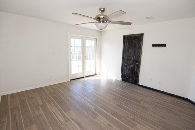 unfurnished room with hardwood / wood-style floors and ceiling fan