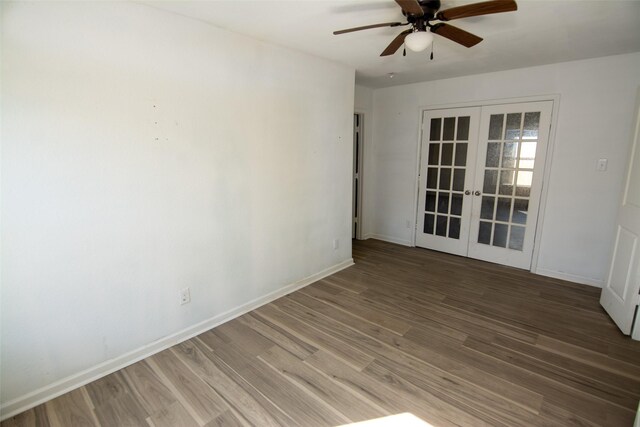 empty room featuring french doors, ceiling fan, and hardwood / wood-style floors