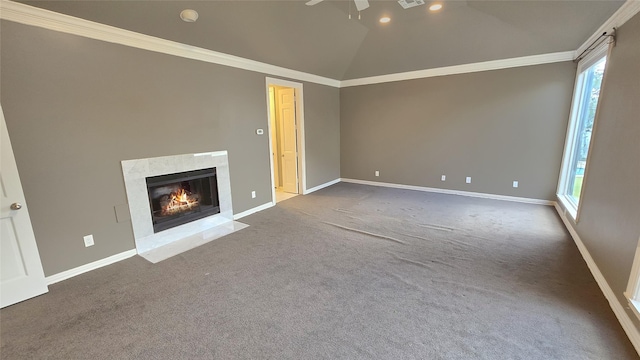 unfurnished living room featuring ceiling fan, carpet, and a healthy amount of sunlight