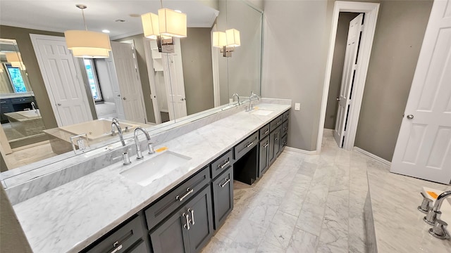 bathroom featuring crown molding and vanity